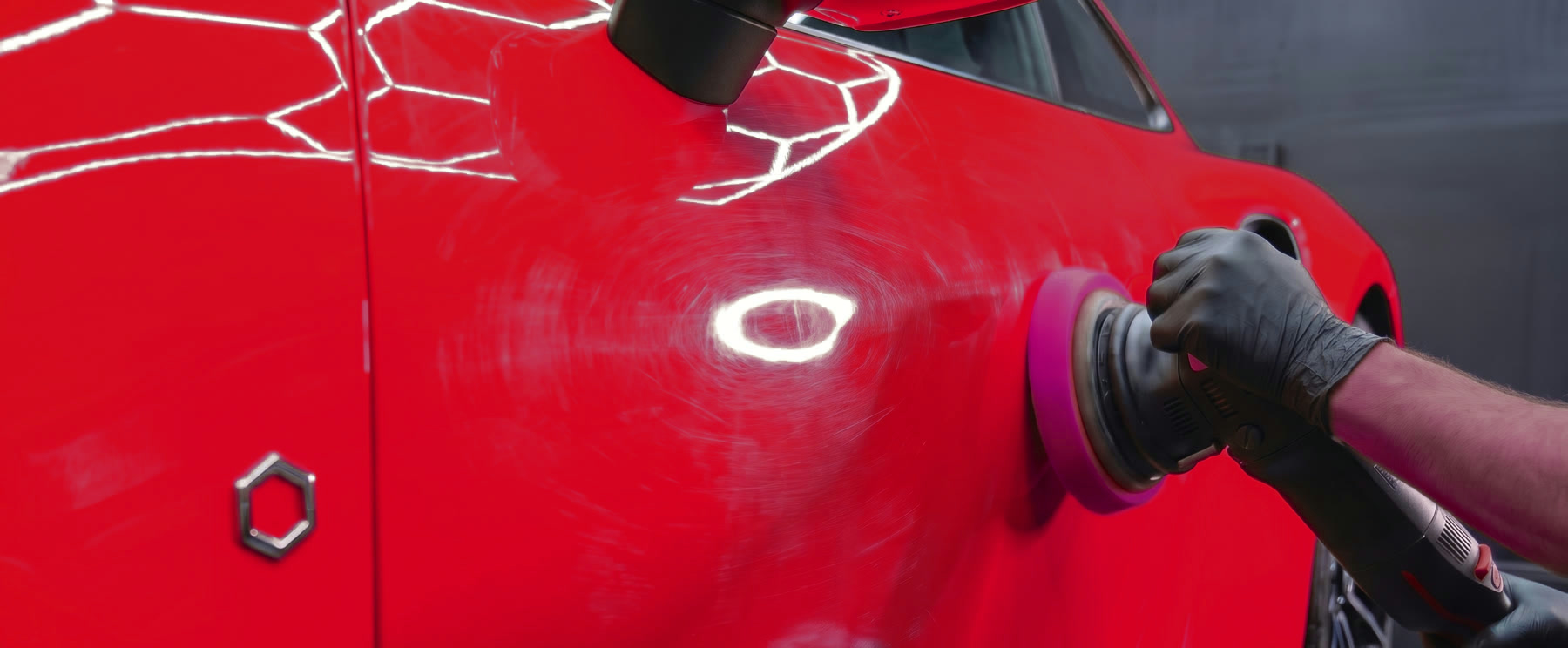 Door before paint correction, covered in swirl marks